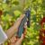 Gardena electric pruner cutting branches