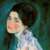 Gustav Klimt festmény részlet, egy arcán kék ponttal díszített nővel