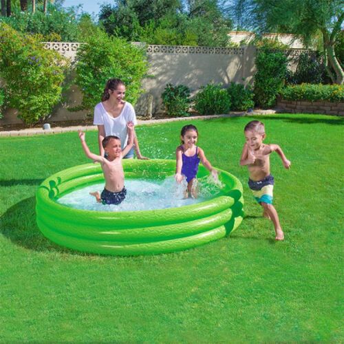 Kids playing in a green Bestway inflatable pool