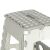 Close-up of Ikonka folding step stool, gray and white