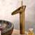TRENDY S Antique Bronze Waterfall Bathroom Sink Faucet installed in a bathroom