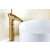 TRENDY S Antique Bronze Waterfall Bathroom Sink Faucet installed on a white sink