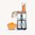 Severin KM 3865 food processor, slicing carrots, with bowl of shredded carrots