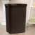 CURVER Style 60L Rattan Effect Laundry Basket, Dark Brown, in Bathroom Setting