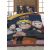 Naruto Shippuden bedding set 140x200 cm on a bed, featuring Naruto, Sasuke, and Sakura