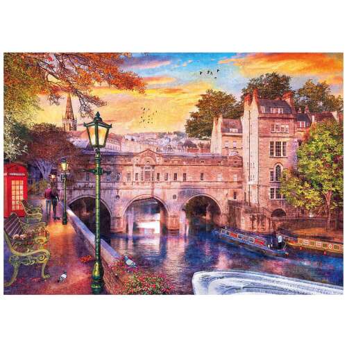 Ravensburger 1000 piece jigsaw puzzle, Bath Romance, depicts a romantic scene of a bridge over a river with a couple walking by