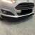 Czarny spoiler przedniego zderzaka, typ B, zamontowany na Ford Fiesta