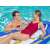 Two people relaxing on the Bestway Nautical Paradise inflatable boat shaped pool float