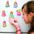 Girl holding a painted princess figurine, 4M Mould & Paint Glitter Crafts Princess