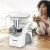 Zelmer ZMM9801B meat grinder angled view in kitchen setting