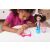 Child painting with Gabby's Dollhouse Gabby Girl Doll set