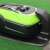 Greenworks Optimow 10 robotic lawnmower side view, showing charging port