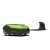 Greenworks Optimow 10 robotic lawnmower, side view, with charging station in the background