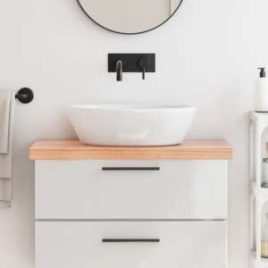 Light brown solid wood bathroom countertop with a white sink and black faucet - Furniture