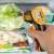 Ray Light 31.1143.13 Infrared Thermometer in use, measuring the temperature of food in a refrigerator