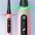 Close-up of Oral-B iO Series 5 Pink Electric Toothbrush pressure sensor lights