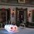 Outdoor Christmas Decoration: Inflatable Snowman Heads on Lawn