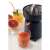 Ariete Citrusprés 417.BK electric citrus juicer, black, in use