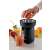 Ariete Citrusprés 417.BK electric citrus juicer, black, in use
