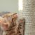 Cat scratching sisal post on Purlov cat tree close-up
