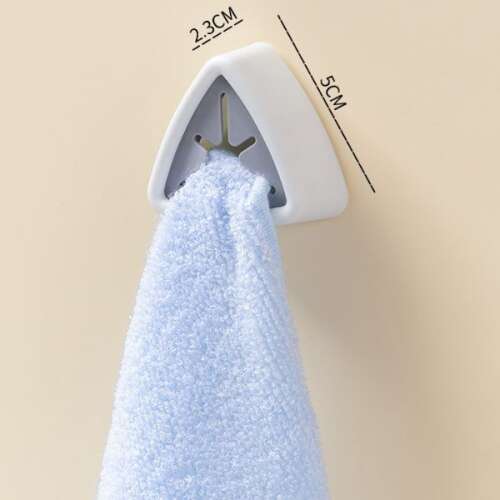 Mercaton® Push Free self-adhesive towel holder, white, 5 x 2.3 cm, triangle shape, mounted on a wall, holding a towel
