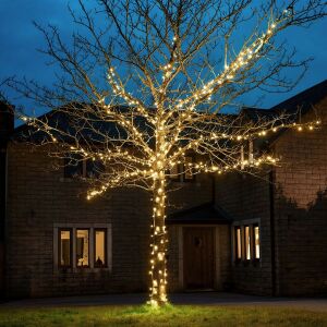 Yoto LED Christmas string lights on a house and tree, outdoor holiday lighting - Flippy String Light