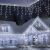 Yoto Christmas Icicle Lights on Snowy House