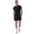 Nebbia 324 férfi funkcionális póló fekete színben, slim fit szabás, nedvességelvezető, gyorsan száradó, 4 irányban rugalmas, raglán ujjak, fényvisszaverő logó, Next Level kollekció