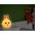 Tracer Bunny LED night light in yellow color on a nightstand