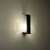 FENIKS wenge wall light illuminating a wall