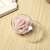 Clear acrylic Christmas ornament with a pink rose inside