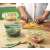 Snips 1.2L airtight food storage container, set of 2, rectangular, clear plastic with green lid, in use