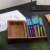 Schneider Slider Basic XB light blue ballpoint pen in a wooden box