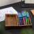 Schneider Slider Basic XB light blue ballpoint pen in a wooden box