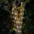 Flippy Warm White LED Rope Light Wrapped Around Tree Trunk