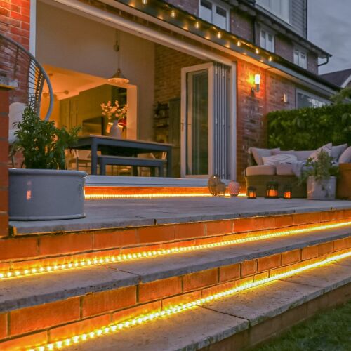 Flippy warm white LED rope lights illuminating outdoor patio steps