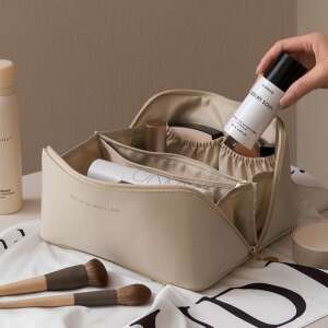 Beige travel makeup bag with zipper, perfect for organizing cosmetics and toiletries - Cosmetic bag