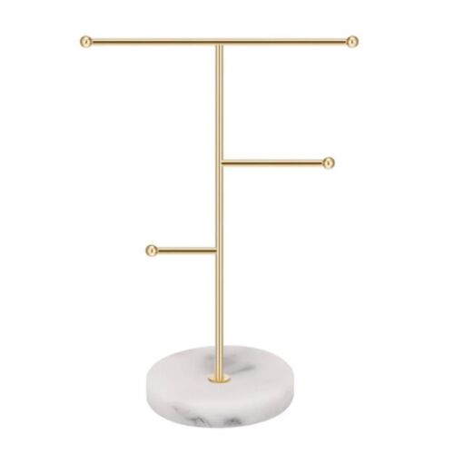 Elegáns arany ékszerállvány márvány talppal.