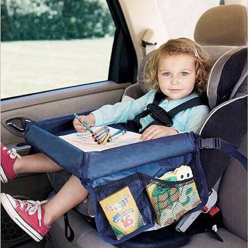 Child using a black waterproof car seat tray with storage pockets
