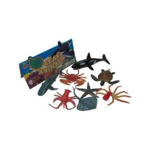 Set of 8 plastic ocean animals, including a shark, crab, turtle, starfish, octopus, and more. Perfect for imaginative play and learning about sea creatures. - Figure