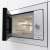 Gorenje BM235G1SYW beépíthető mikrohullámú sütő nyitott ajtóval, a belső tér és a grill látható